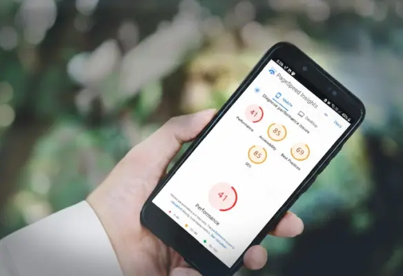 A smartphone showing poor diagnostic scores for a website.